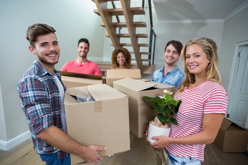Furniture removals team planning a move in Watford home
