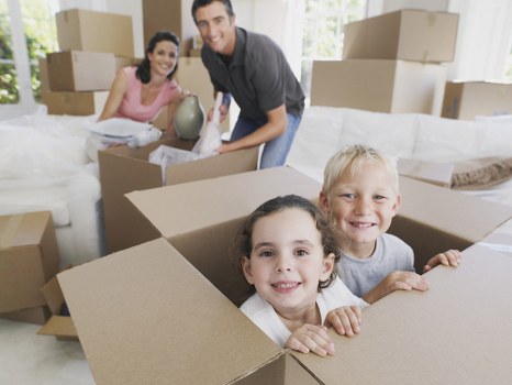 Packed household boxes prepared for a Watford house move