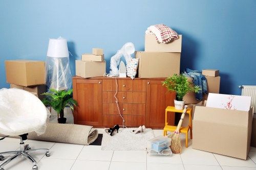 House removalists loading furniture for a Watford home move