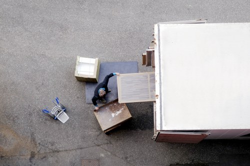 Local removals team loading items for a same-day move in Watford