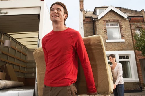 Local moving team handling boxes and household items