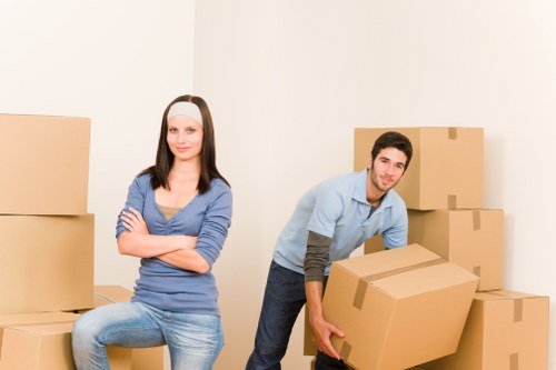 Careful furniture handling during a house move in Watford