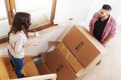 Office furniture being carefully moved during a Watford business relocation