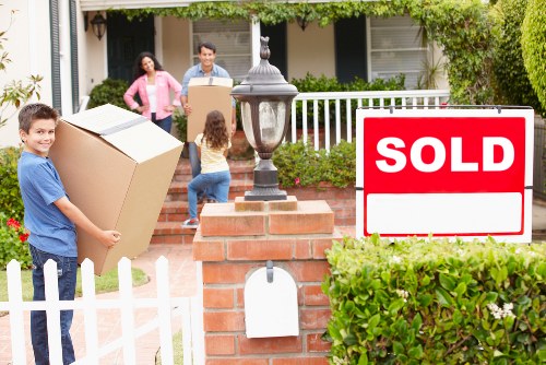 Household items being unloaded at a new Watford property