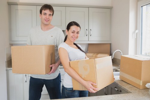 Packed household items ready for transport during a local move in Watford